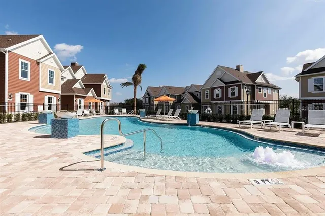 a swimming pool with view of buildings