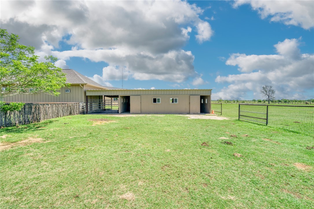 9652 Locke Road Bryan, TX 77808 - Photo 36 of 50 BACK VIEW OF STABLE AREA