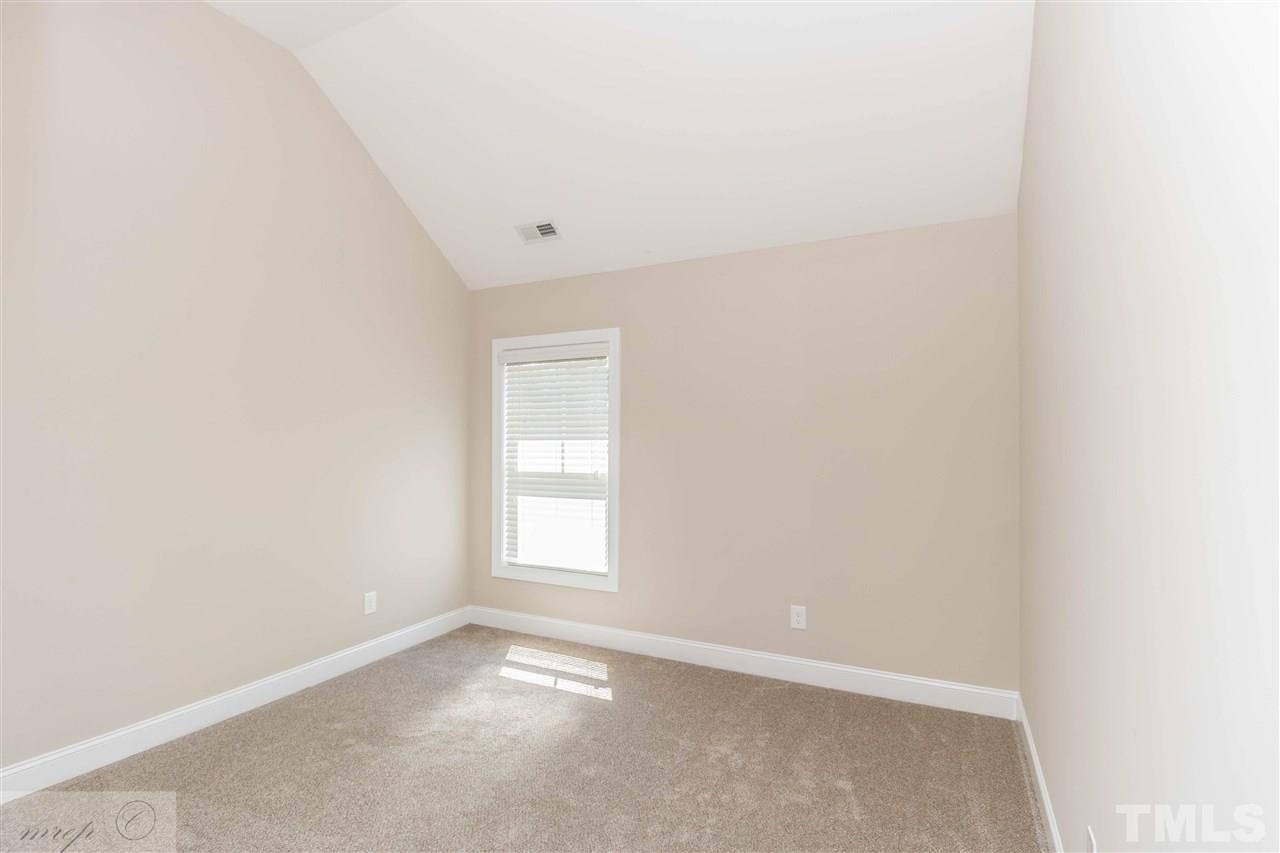 3508 Bloomfield Way Raleigh, NC 27616 - Photo 17 of 24 a view of an empty room with a window