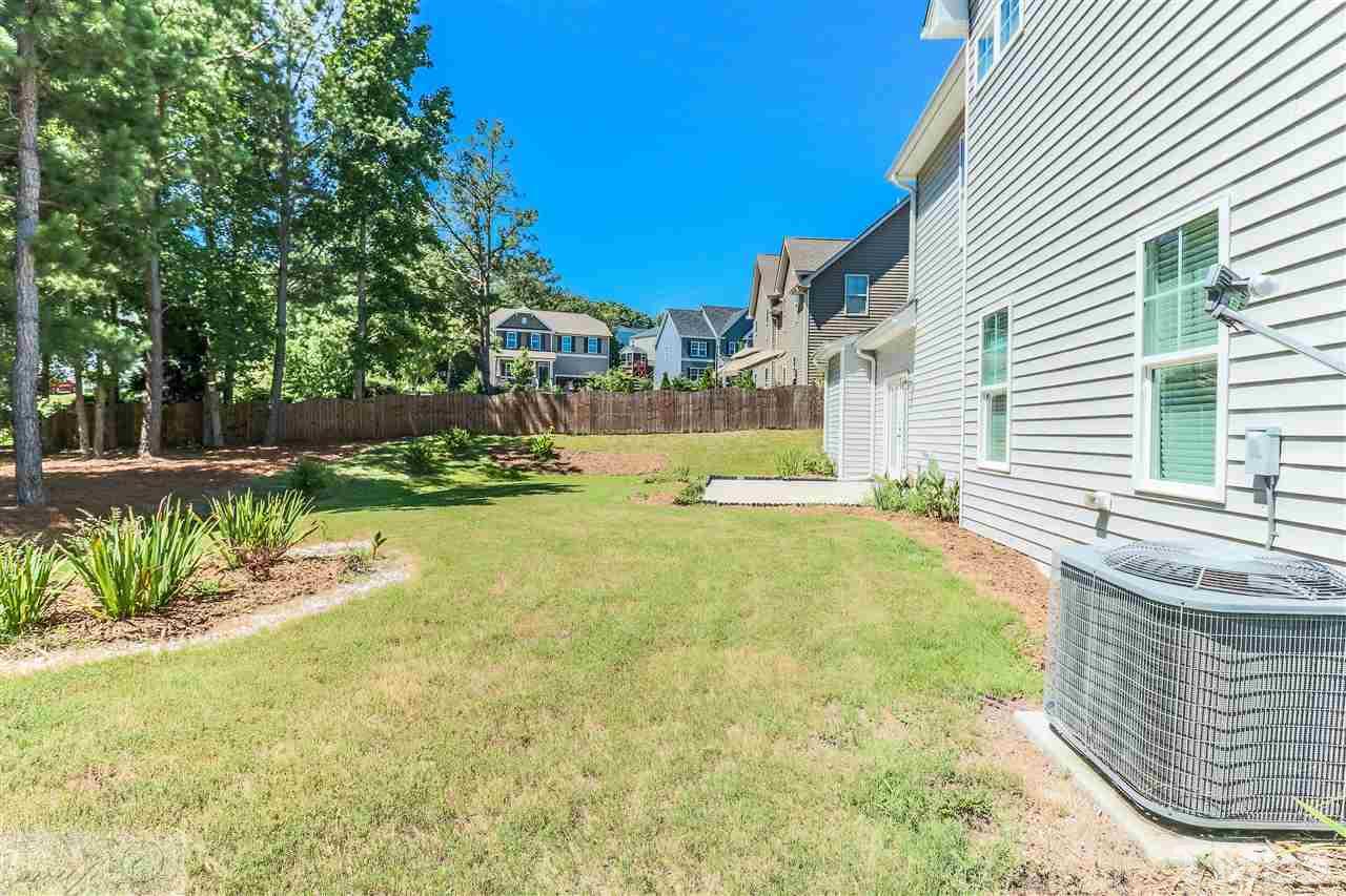 3508 Bloomfield Way Raleigh, NC 27616 - Photo 23 of 24 a view of swimming pool with lawn chairs and plants