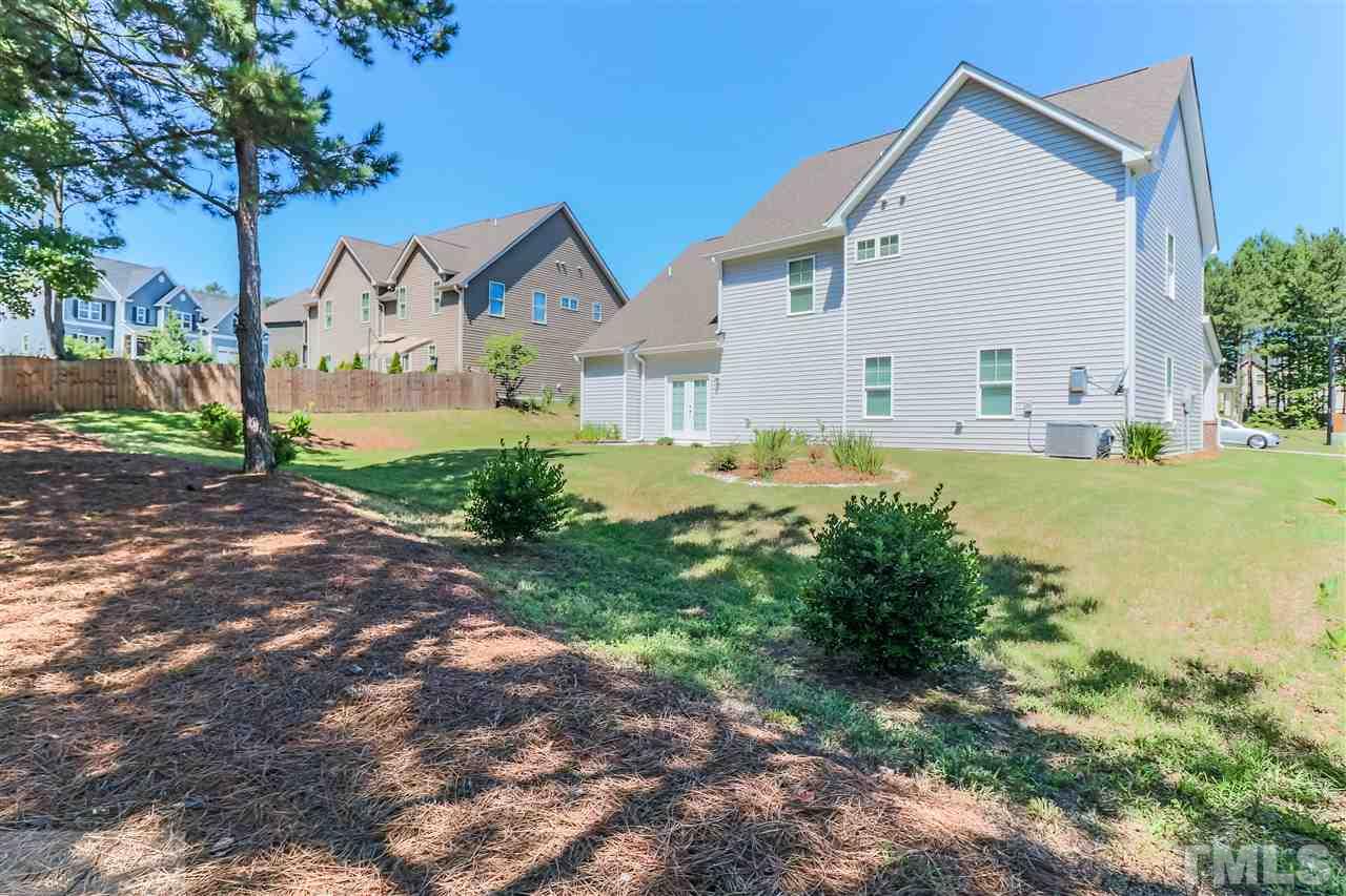 3508 Bloomfield Way Raleigh, NC 27616 - Photo 24 of 24 a view of a house with backyard and garden