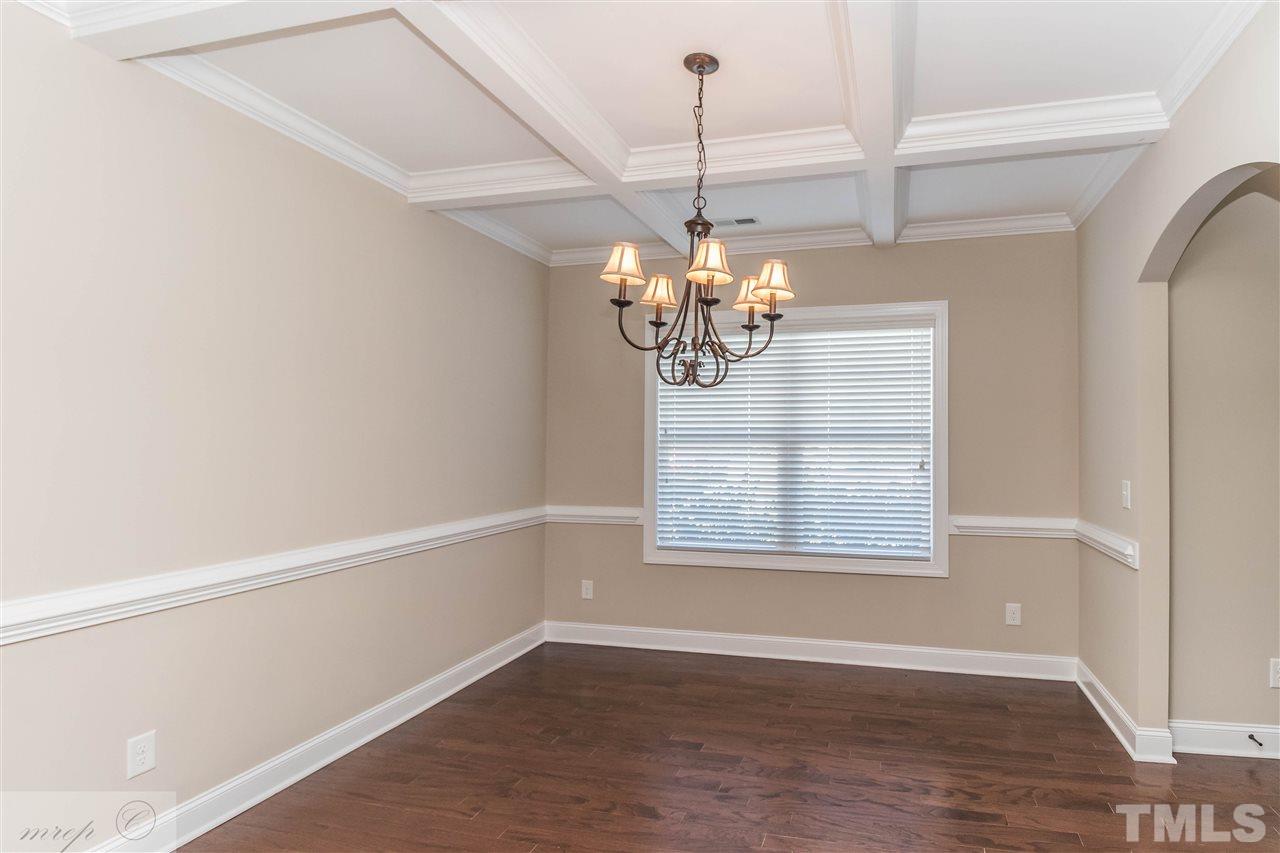 3508 Bloomfield Way Raleigh, NC 27616 - Photo 9 of 24 a view of a room with wooden floor chandelier and windows