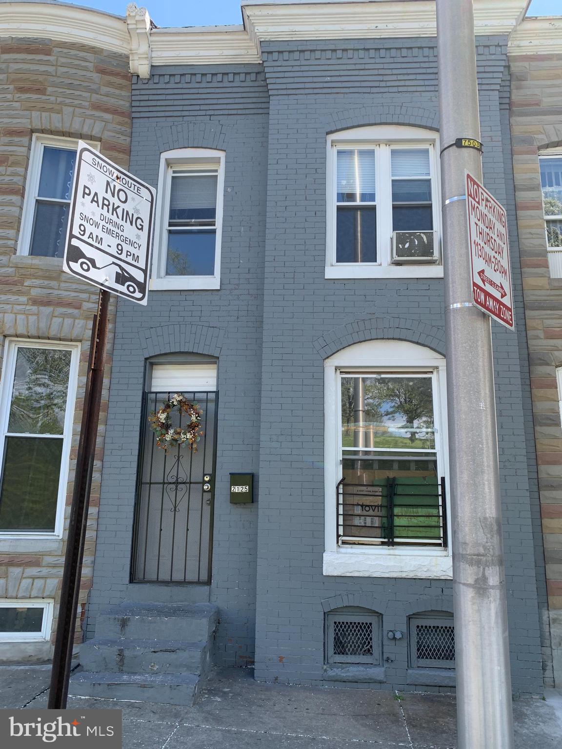 a front view of a building with front door