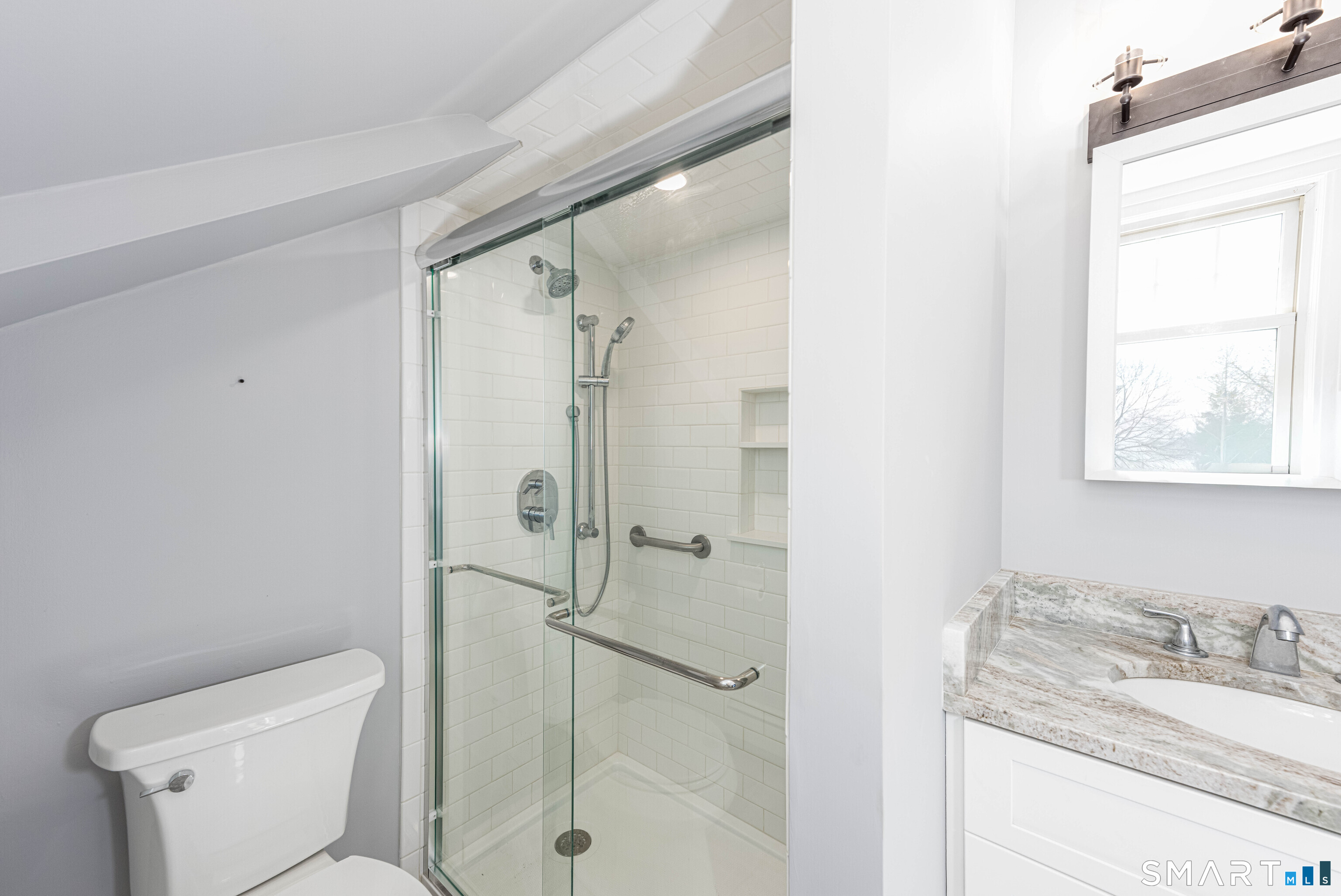 148 Everit Street, Unit F New Haven, CT 06511 - Photo 20 of 26 a bathroom with a granite countertop sink toilet and shower