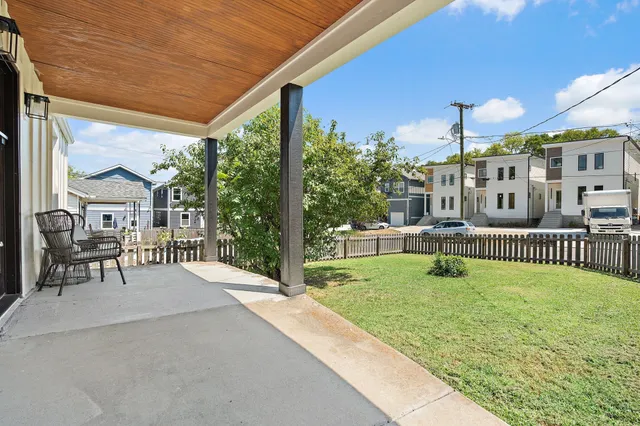 a garden view with a sitting space
