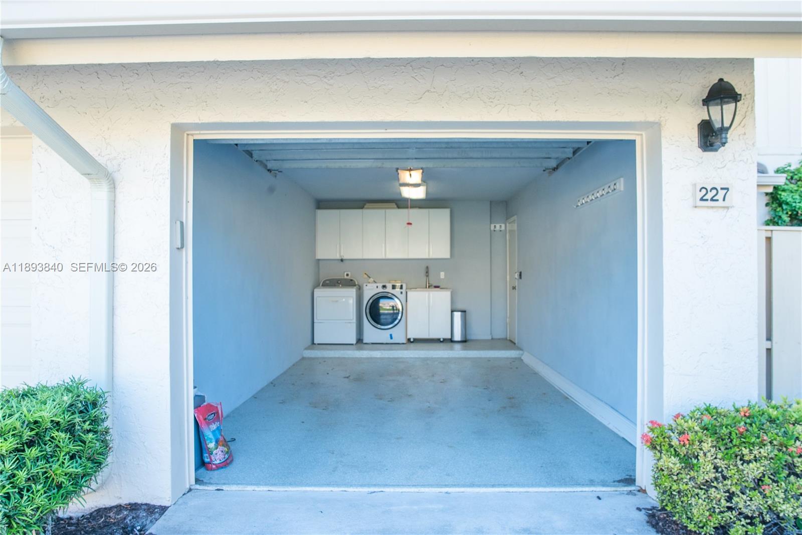 17081 Waterbend Drive, Unit 227 Jupiter, FL 33477 - Photo 29 of 38 a view of a hallway with entryway