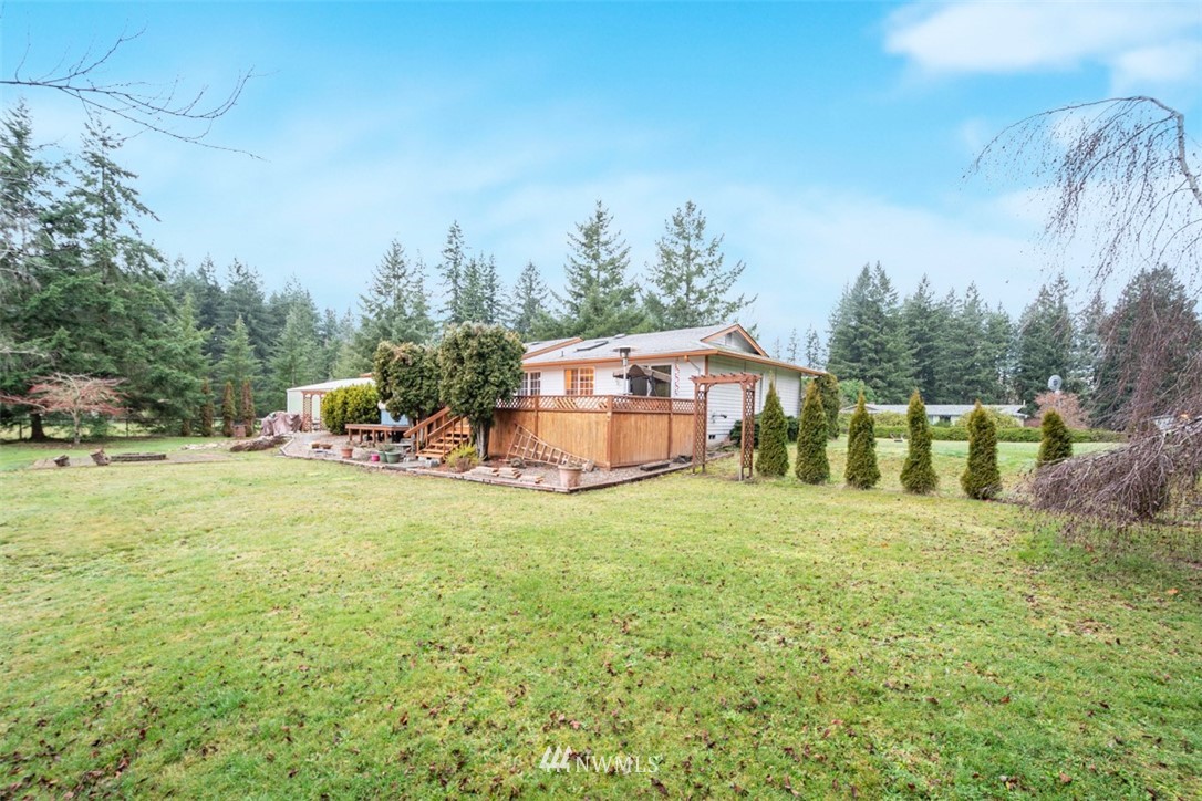 209 Vista Road Chehalis, WA 98532 - Photo 19 of 22 a view of a house with a yard and sitting area
