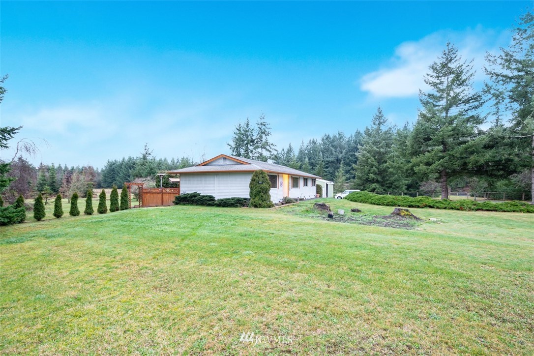 209 Vista Road Chehalis, WA 98532 - Photo 20 of 22 a view of a house with a yard and sitting area
