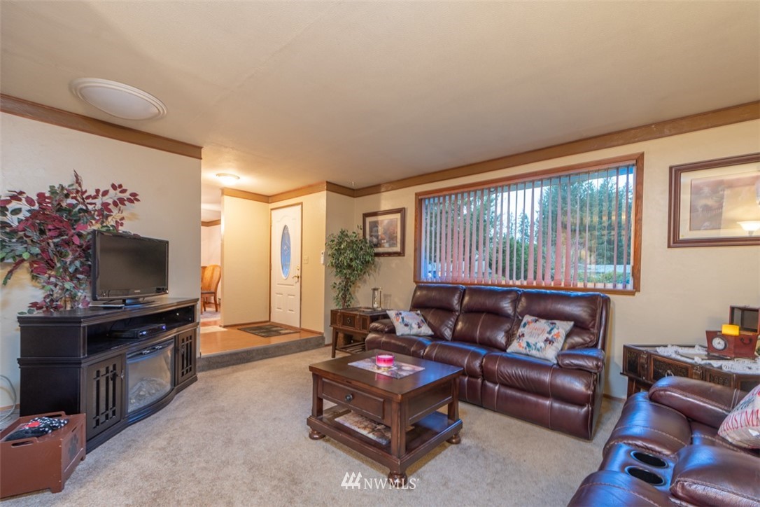 209 Vista Road Chehalis, WA 98532 - Photo 3 of 22 a living room with furniture and a flat screen tv