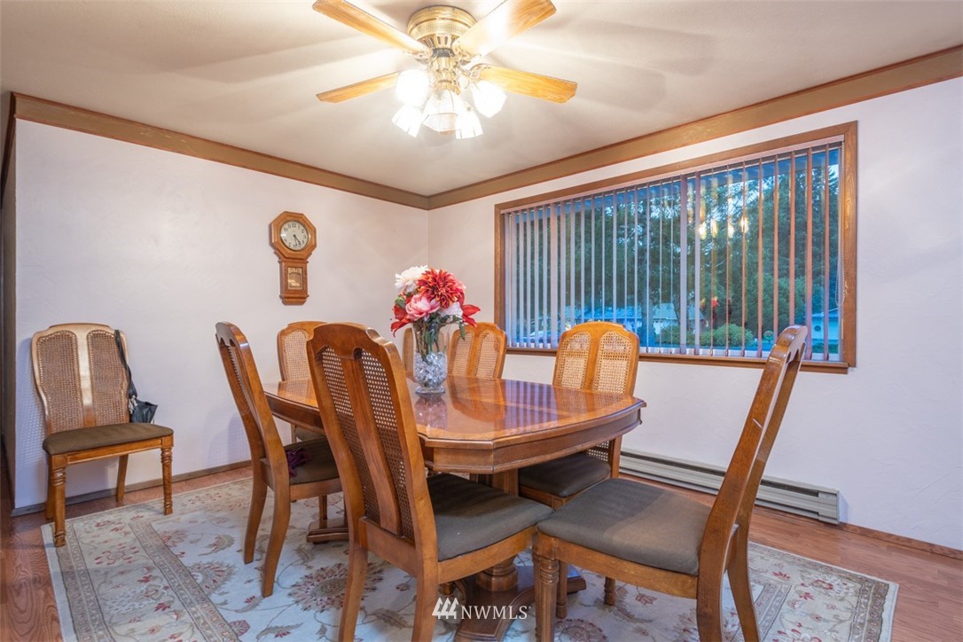 209 Vista Road Chehalis, WA 98532 - Photo 7 of 22 a dining room with furniture and wooden floor