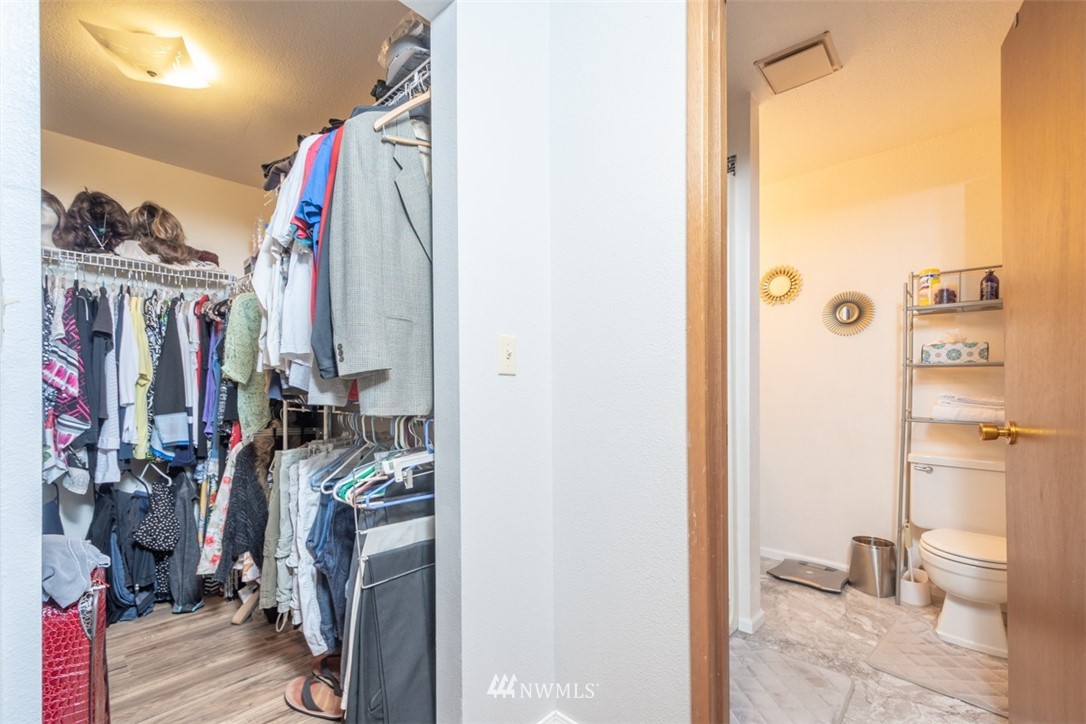 209 Vista Road Chehalis, WA 98532 - Photo 9 of 22 a view of walk in closet with clothes and shoes