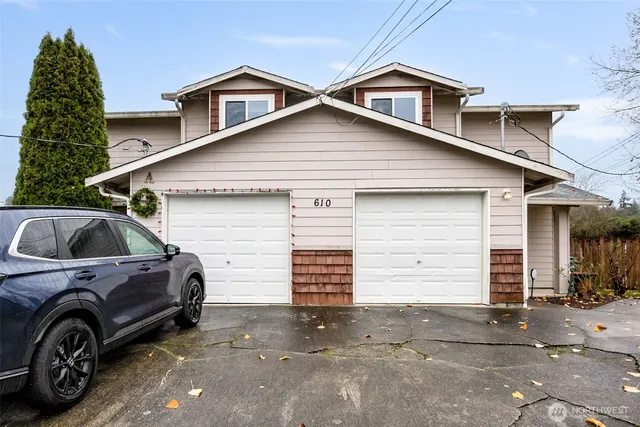 a view of a car in front of house