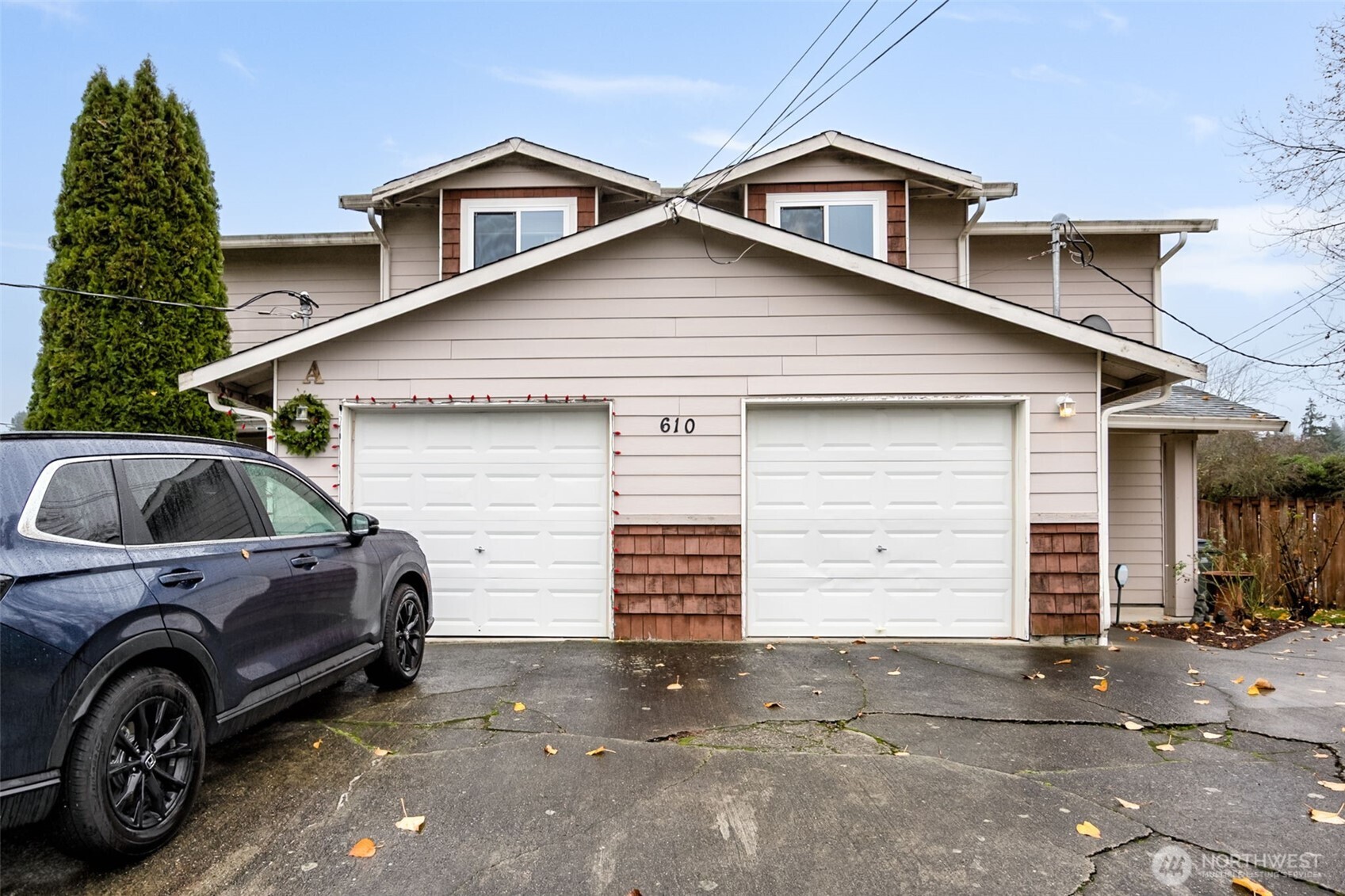 a view of a car in front of house