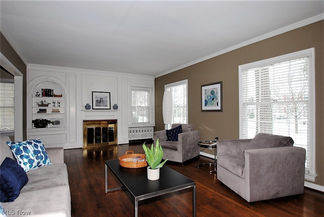 3722 Traver Road Shaker Heights, OH 44122 - Photo 2 of 22 Living room with hardwood floors, fireplace, built ins and crown molding.