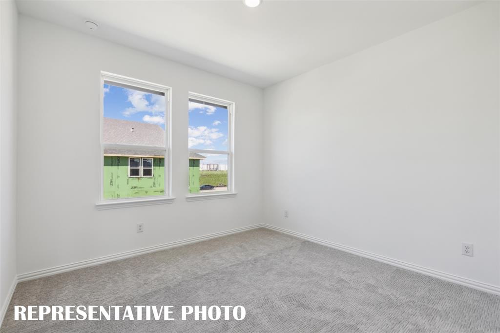 1331 Rooted Road Frisco, TX 75033 - Photo 11 of 14 You'll find nicely sized secondary bedrooms in our Helaina plan. REPRESENTATIVE PHOTO
