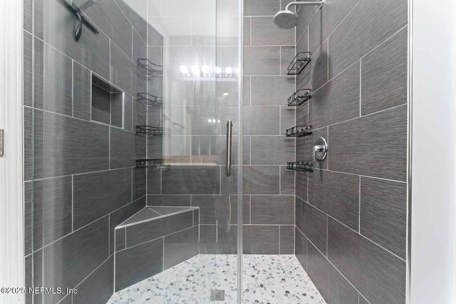 5663 Greenland Road, Unit 1201 Jacksonville, FL 32258 - Photo 13 of 18 a bathroom with a shower