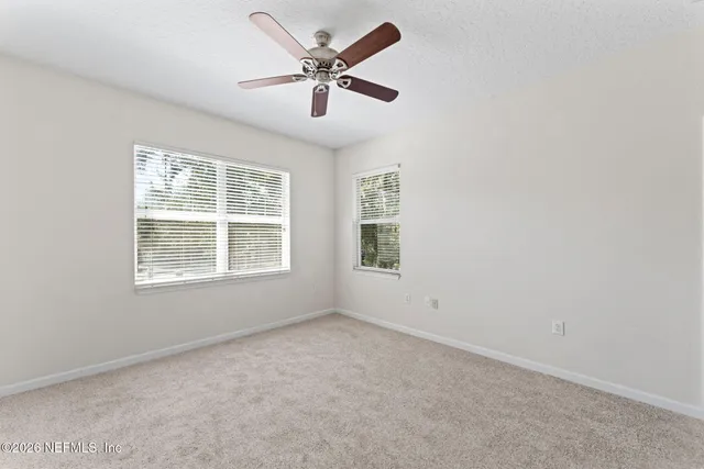 a front view of a house with a garage
