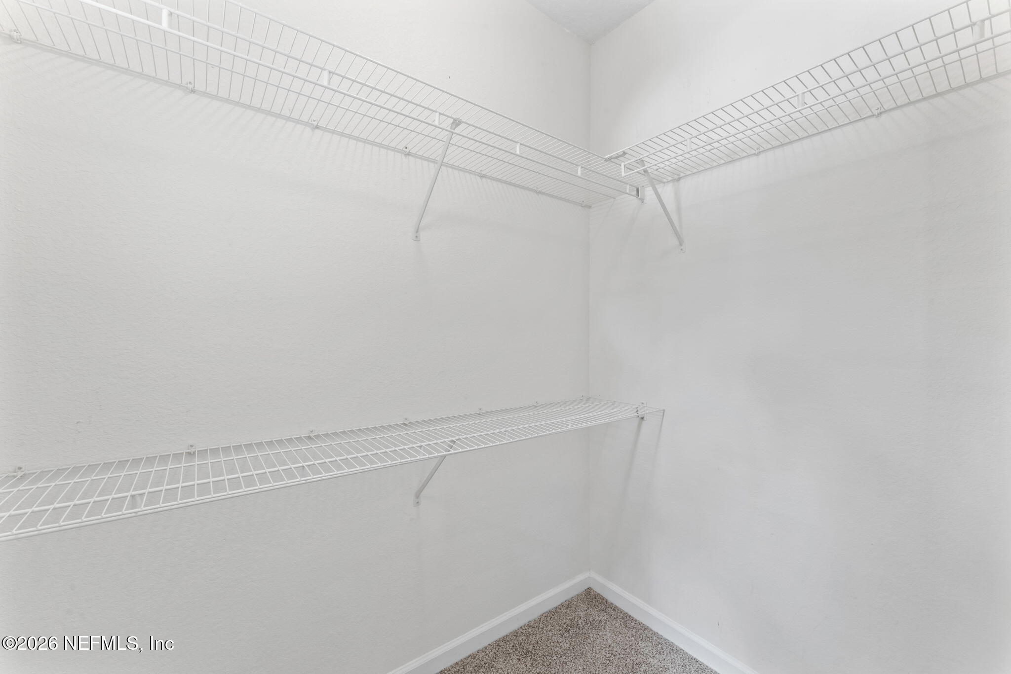 5663 Greenland Road, Unit 1201 Jacksonville, FL 32258 - Photo 35 of 82 a view of small space with racks on the wall