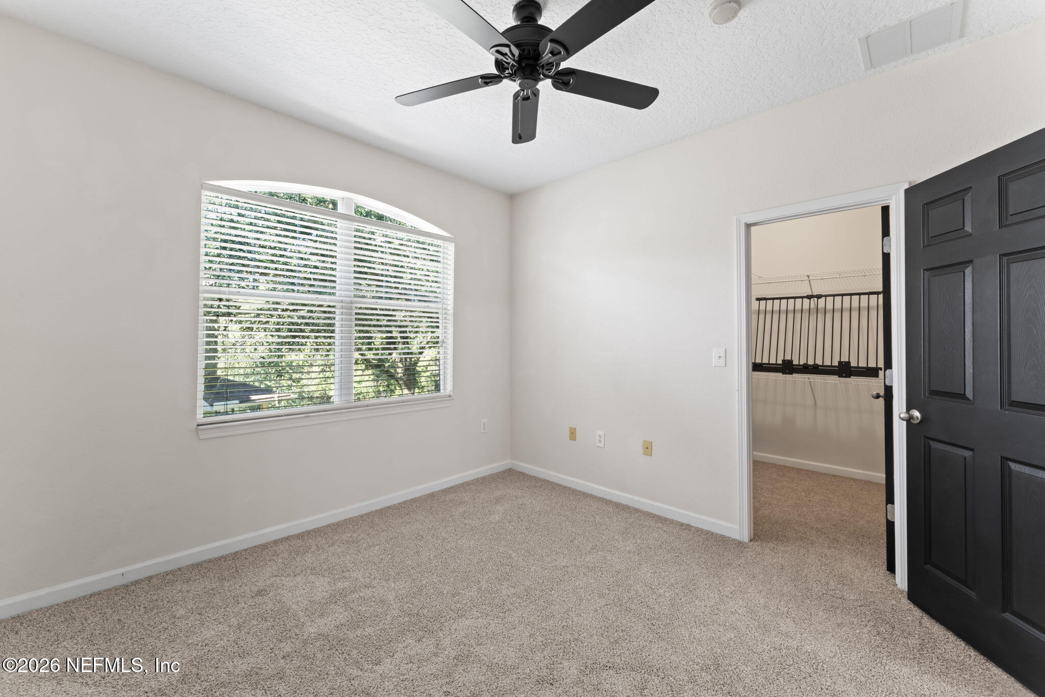 5663 Greenland Road, Unit 1201 Jacksonville, FL 32258 - Photo 44 of 82 a view of an empty room with a window