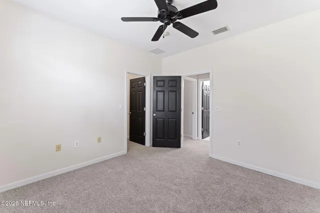 an aerial view of a house with a garden