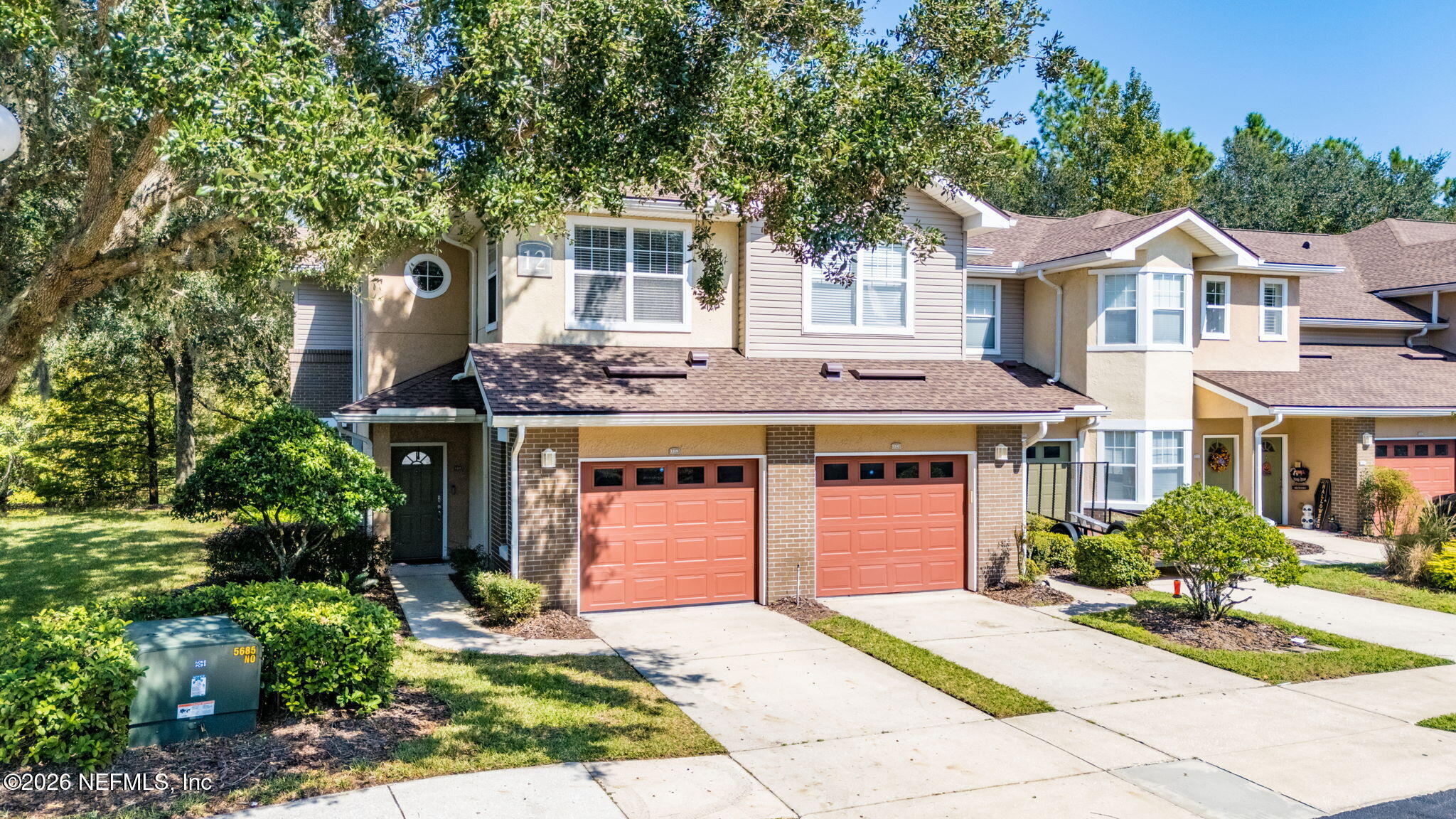 5663 Greenland Road, Unit 1201 Jacksonville, FL 32258 - Photo 66 of 82 a front view of a house with a yard