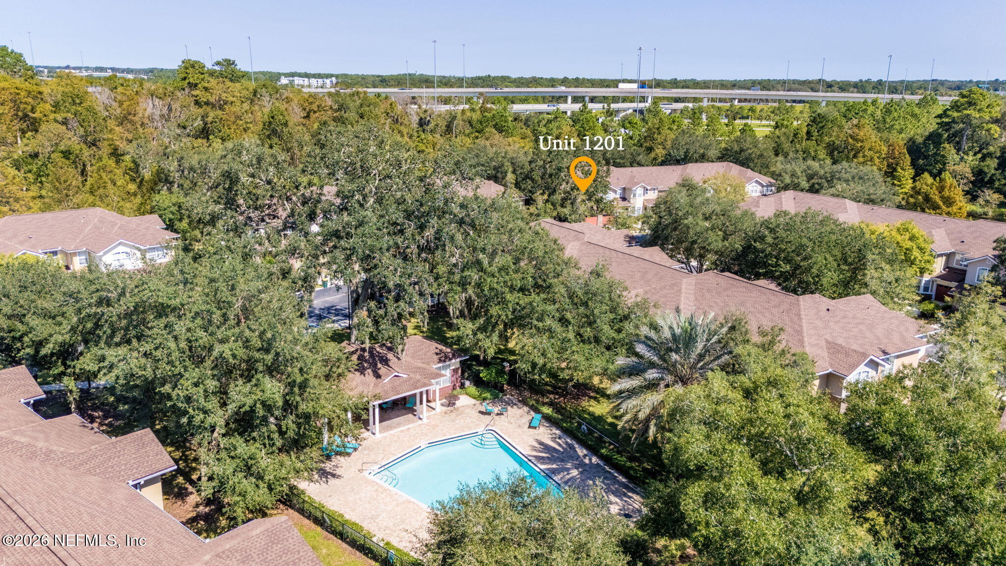 5663 Greenland Road, Unit 1201 Jacksonville, FL 32258 - Photo 75 of 82 an aerial view of a houses with a yard and lake view