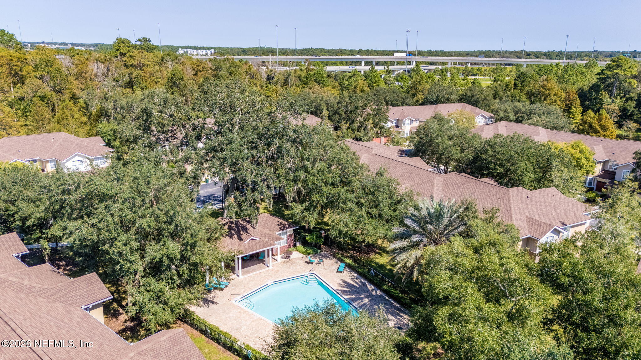 5663 Greenland Road, Unit 1201 Jacksonville, FL 32258 - Photo 76 of 82 an aerial view of a houses with a yard and lake view