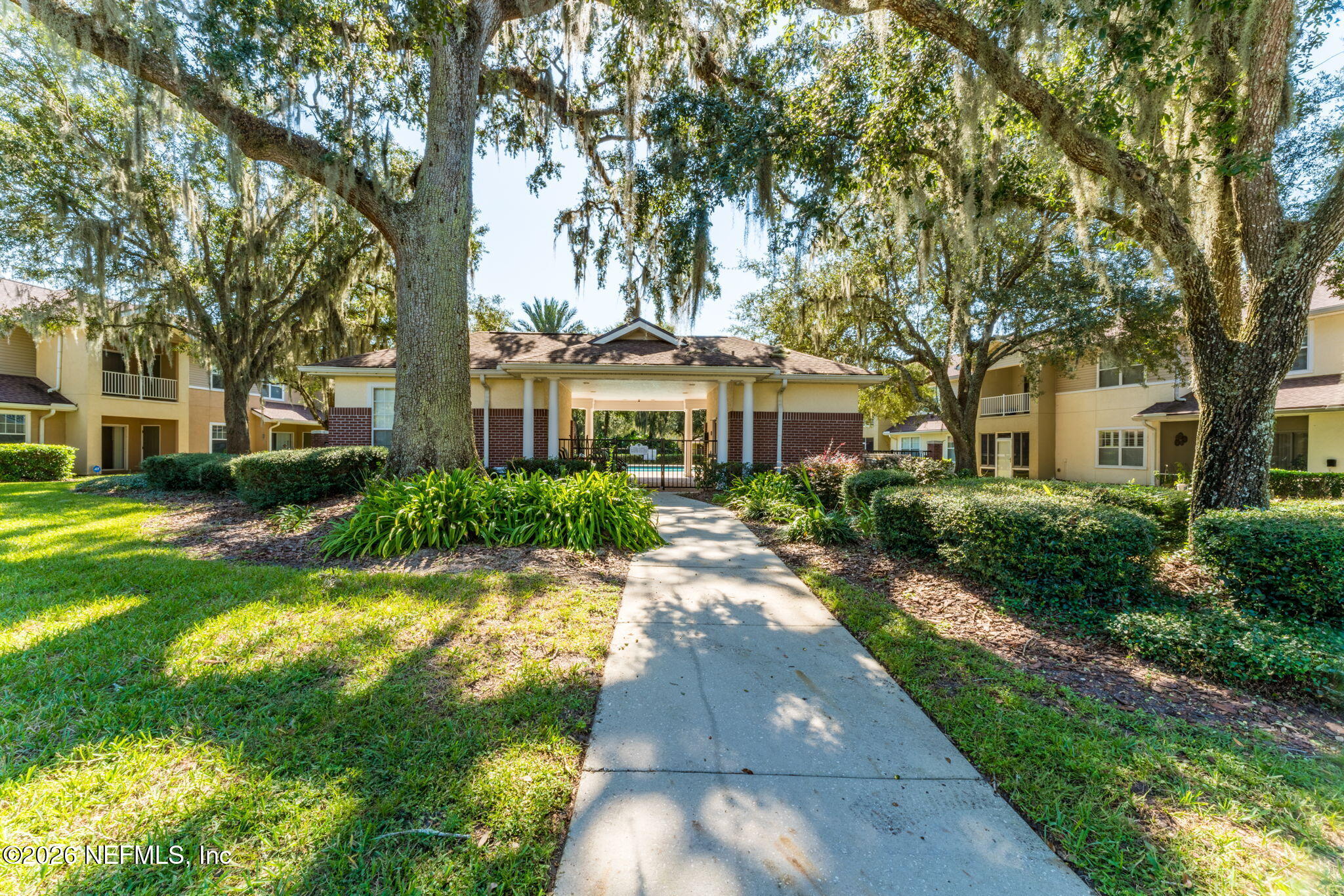 5663 Greenland Road, Unit 1201 Jacksonville, FL 32258 - Photo 77 of 82 a front view of a house with a yard