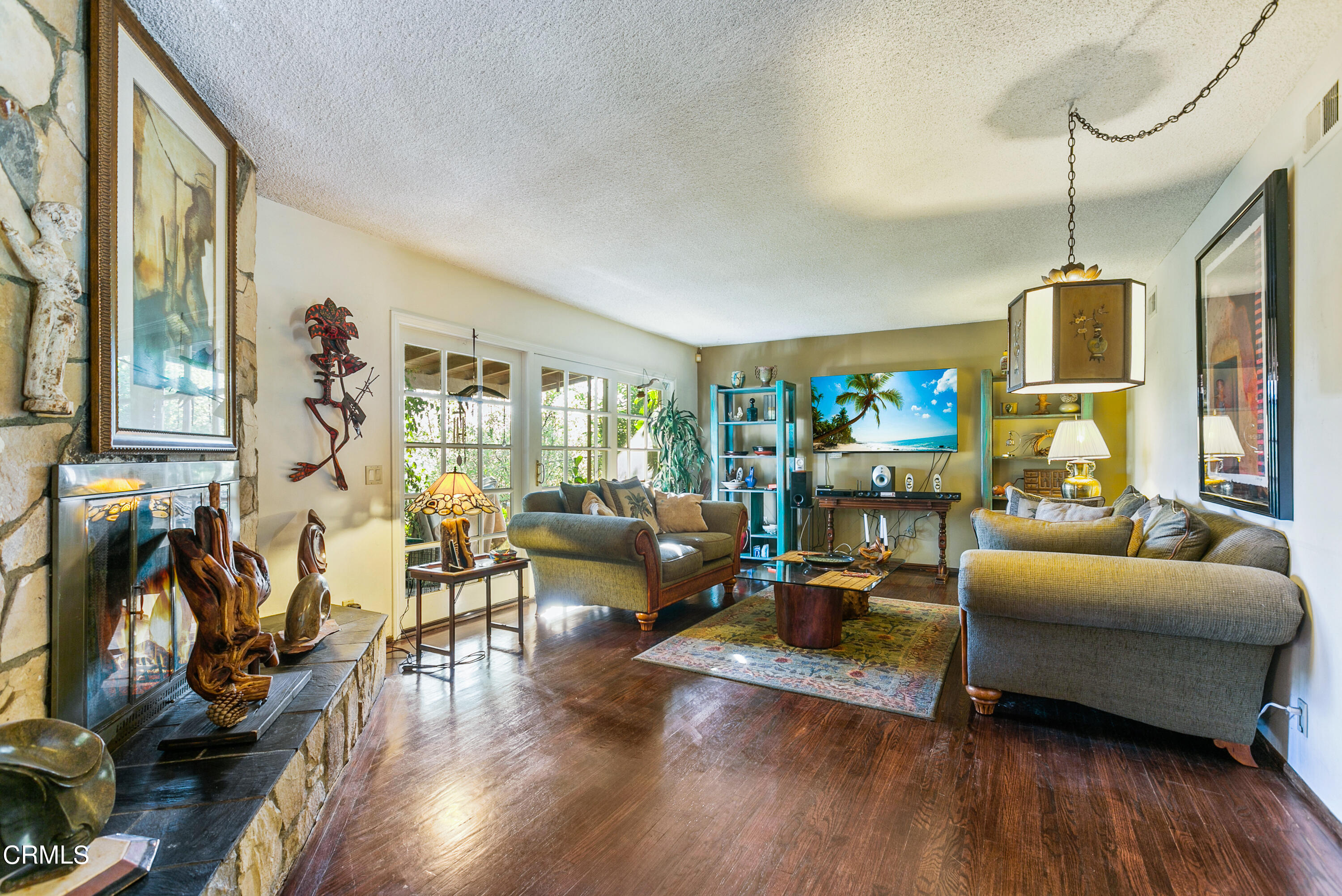 4131 Aralia Road Altadena, CA 91001 - Photo 3 of 19 a living room with furniture or couch and a wooden floor