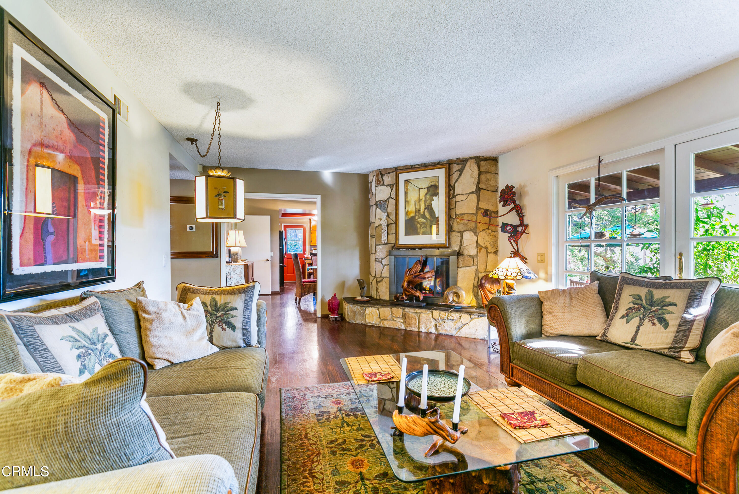 4131 Aralia Road Altadena, CA 91001 - Photo 4 of 19 a living room with furniture and floor to ceiling windows