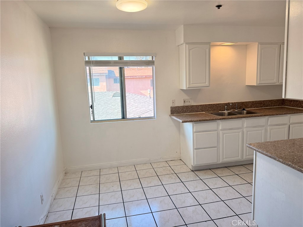 1330 Stevens Avenue, Unit E San Gabriel, CA 91776 - Photo 7 of 12 a view of a kitchen with a sink