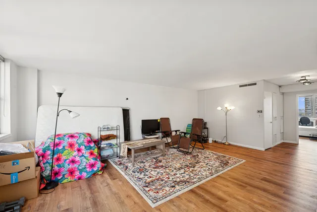 a very nice looking room with a wooden floor