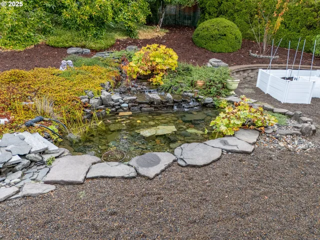 a view of a backyard of the house