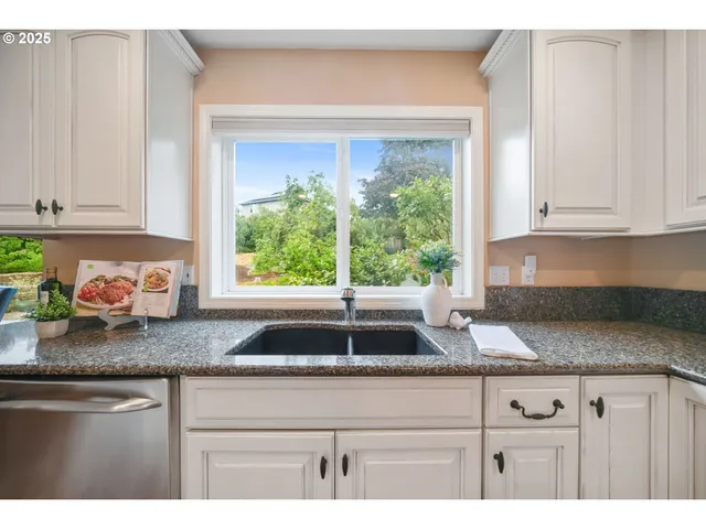a outdoor sitting area with furniture and wooden floor