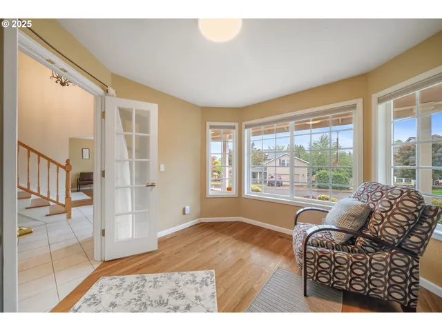 a bedroom with a bed and a night stand