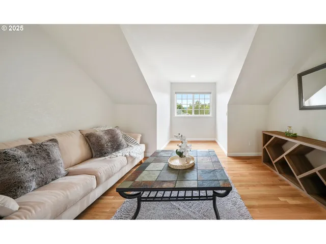 a living room with a couch and a table