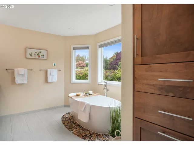 a bathroom with a shower and a sink