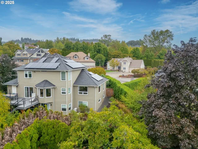 an aerial view of a house with a garden