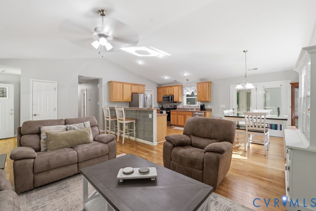 5307 St Pauls Church Road Goochland, VA 23063 - Photo 12 of 44 a living room with furniture kitchen and a chandelier