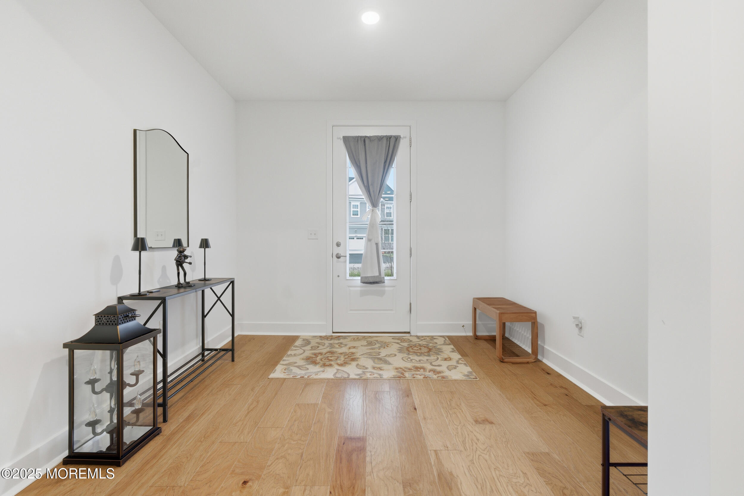 130 Woolley Court Oakhurst, NJ 07712 - Photo 3 of 34 a view of a room with wooden floor