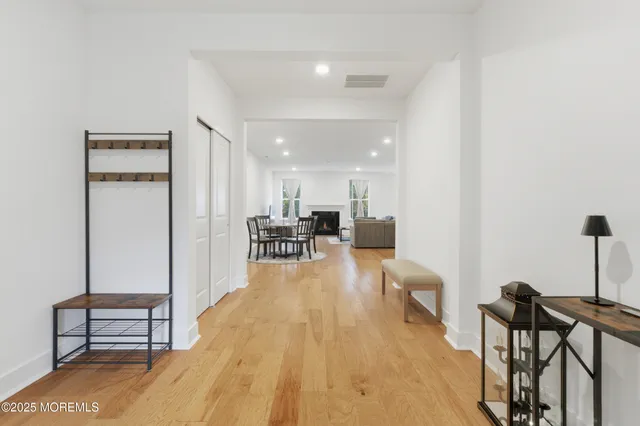 a living room with furniture a table and chairs