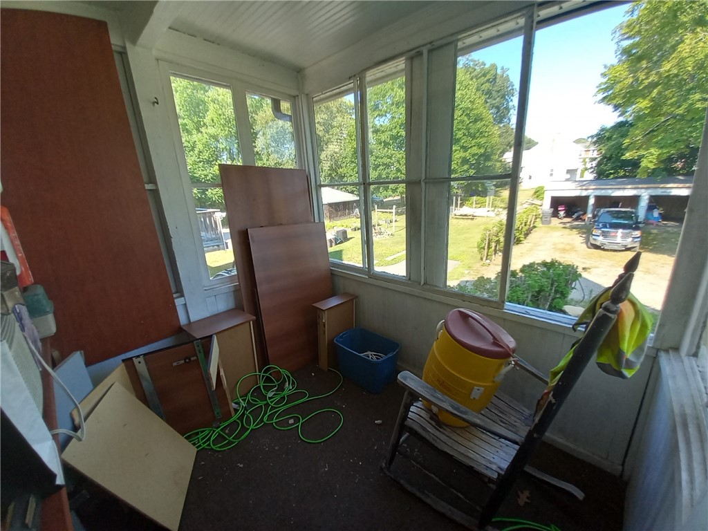 22 Spring Street Westerly, RI 02891 - Photo 8 of 19 2nd floor apartment enclosed porch