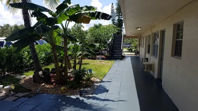 a backyard of a house with lots of green space