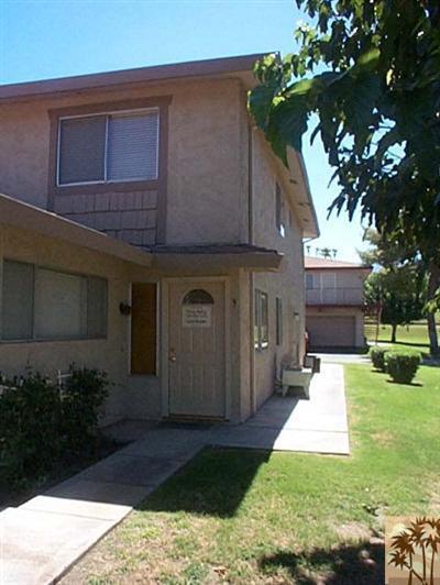 72685 Raven Road, Unit 3 Palm Desert, CA 92260 - Photo 3 of 8 a view of a house with a yard