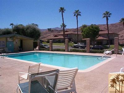 72685 Raven Road, Unit 3 Palm Desert, CA 92260 - Photo 7 of 8 a view of a backyard with sitting area