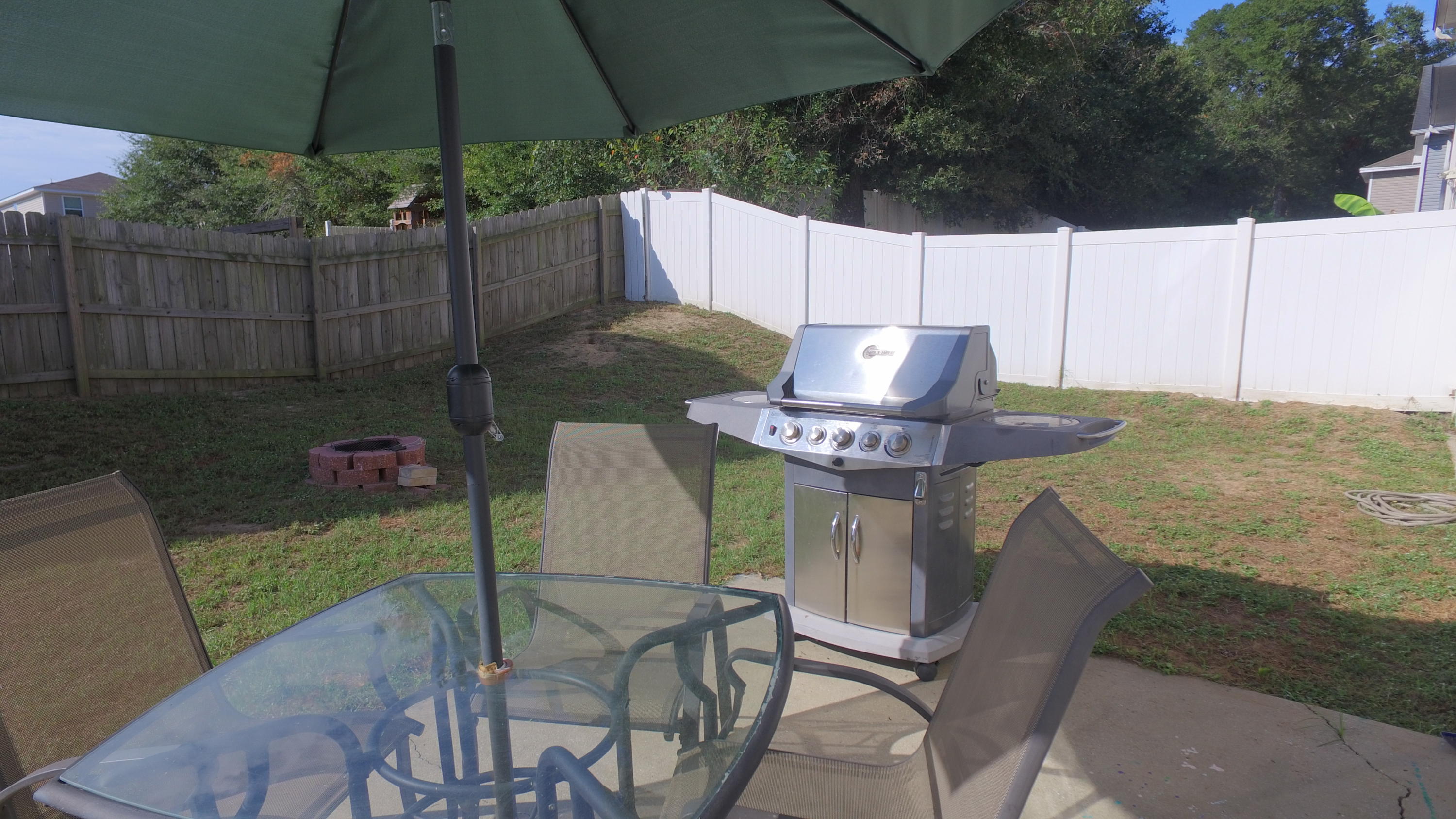 303 Dahlquist Drive Crestview, FL 32539 - Photo 15 of 15 a view of a chairs and table in the patio