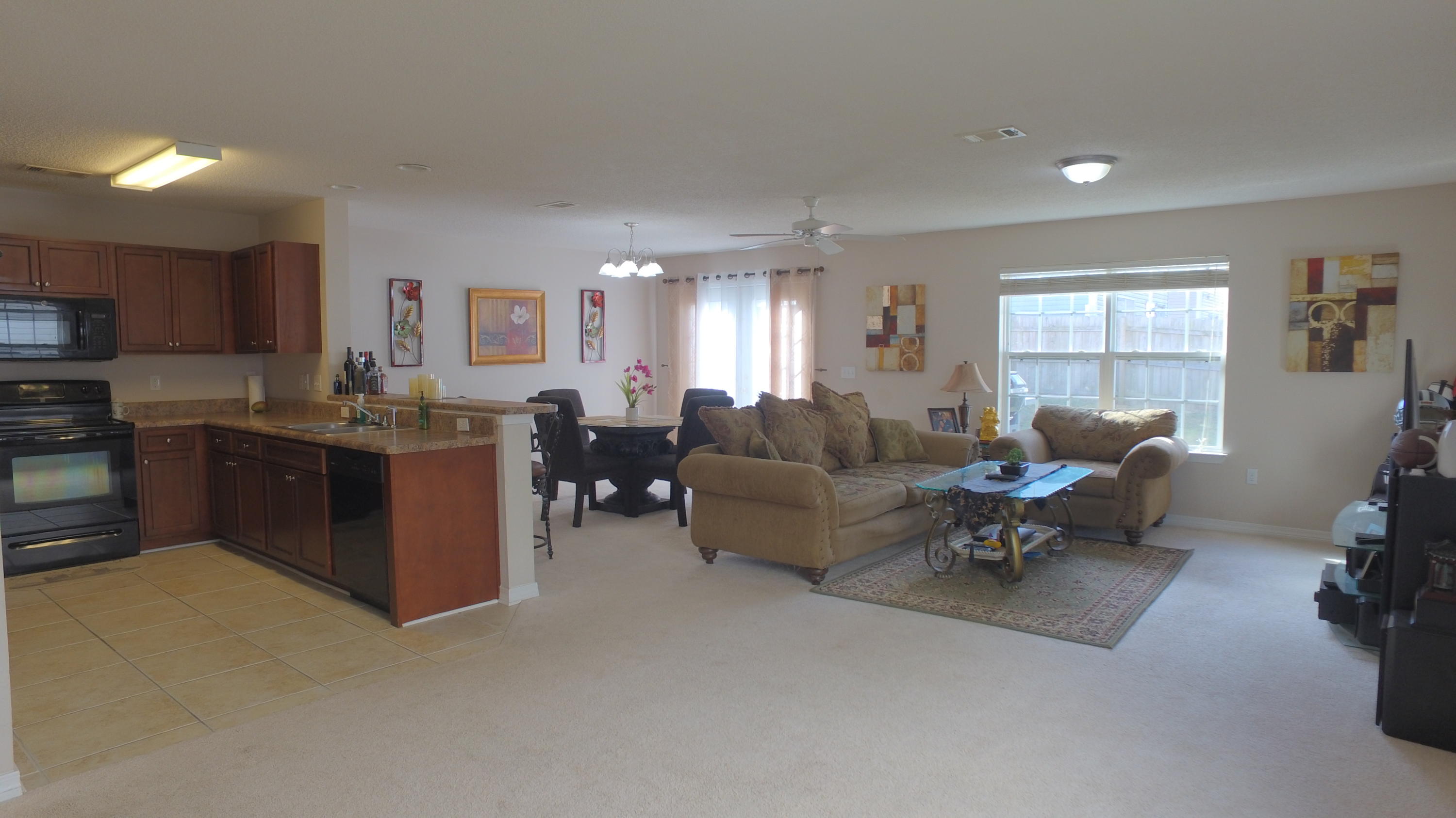 303 Dahlquist Drive Crestview, FL 32539 - Photo 3 of 15 a living room with furniture and a window