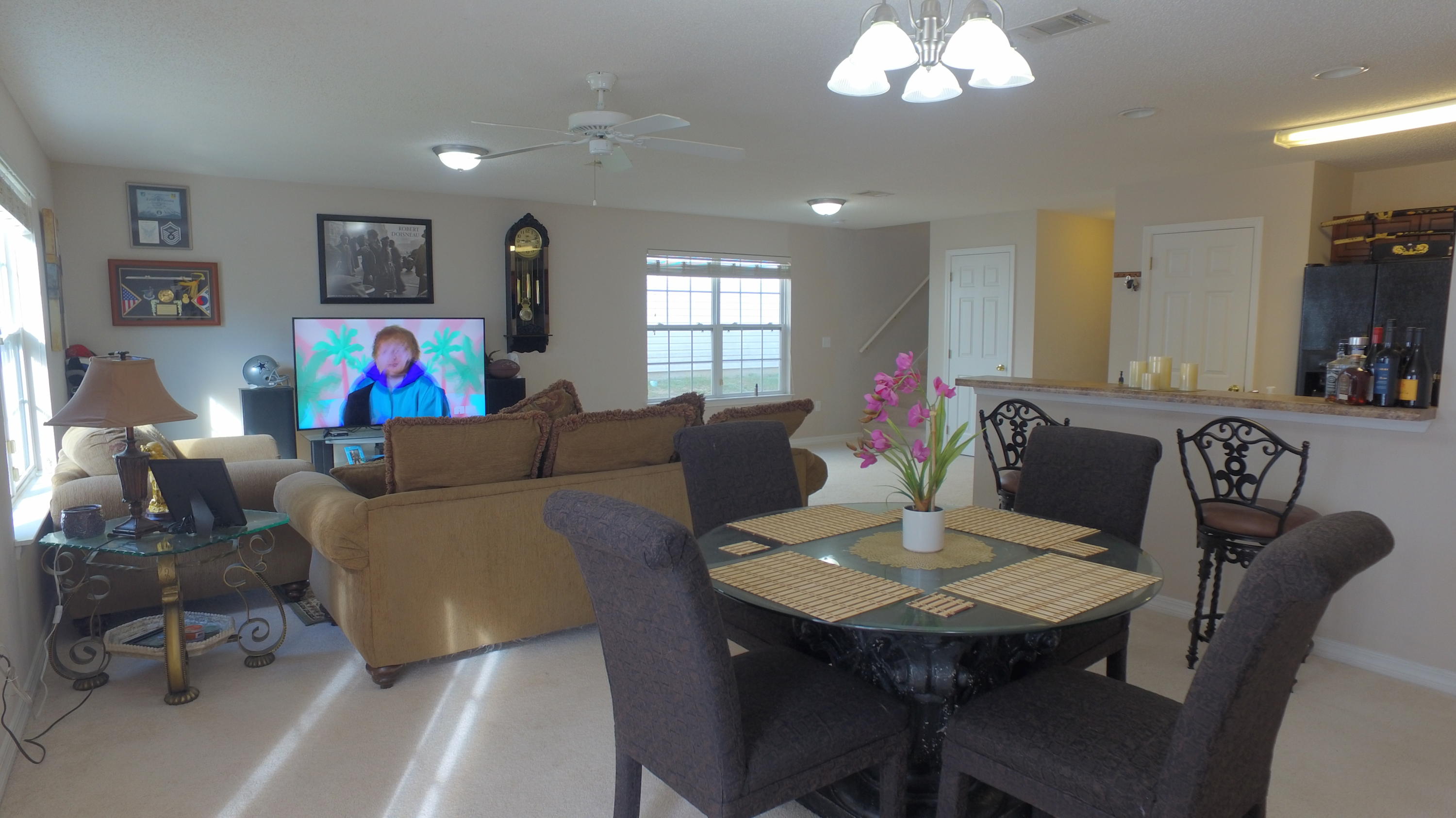303 Dahlquist Drive Crestview, FL 32539 - Photo 5 of 15 a view of a dining room with furniture and a chandelier