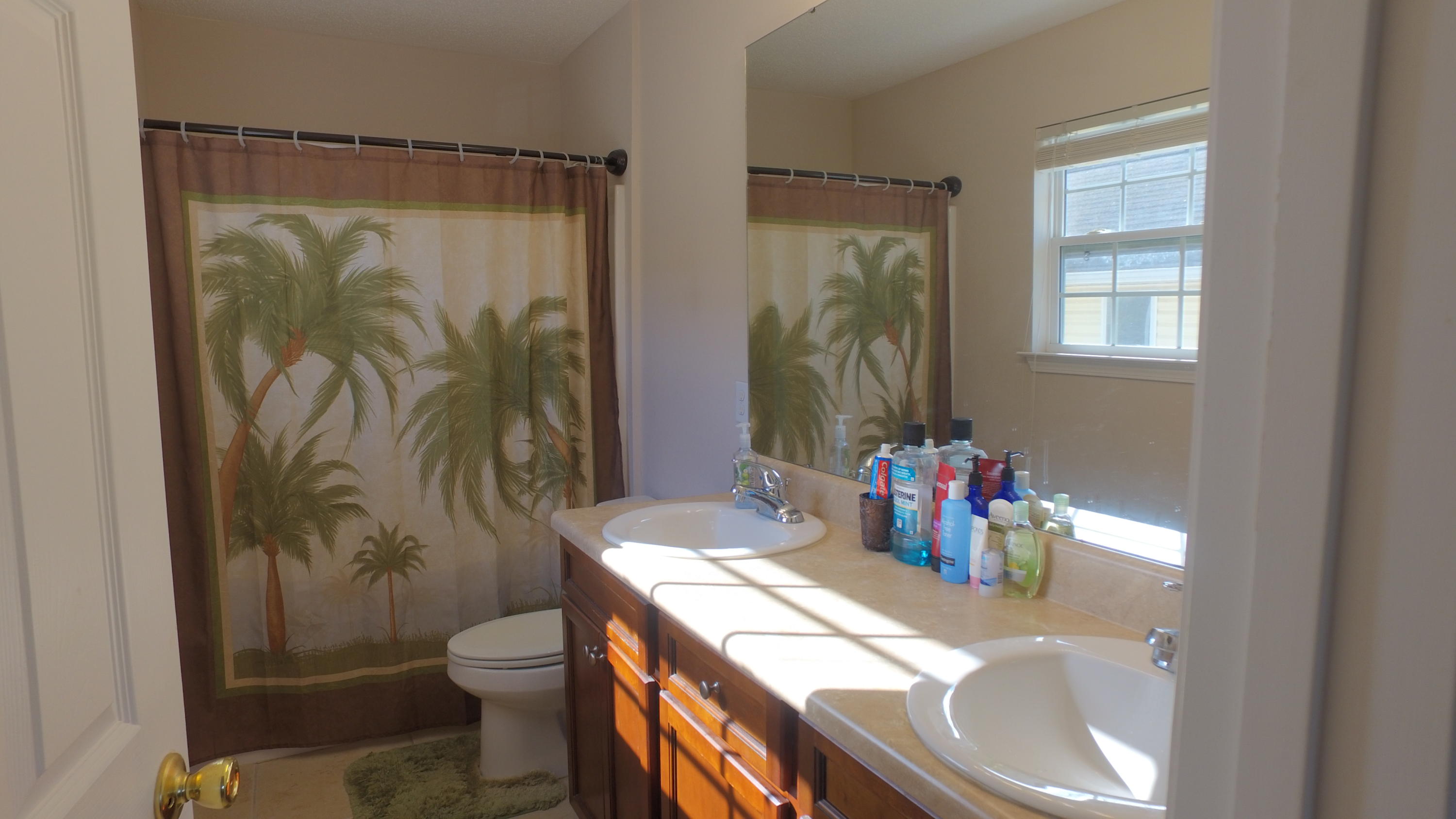 303 Dahlquist Drive Crestview, FL 32539 - Photo 10 of 15 a bathroom with a sink toilet and shower