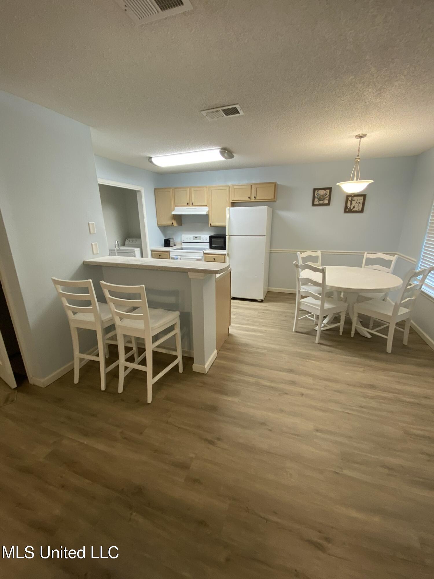 5080 Gautier Vancleave Road, Unit B11 Gautier, MS 39553 - Photo 7 of 15 IMG_4537